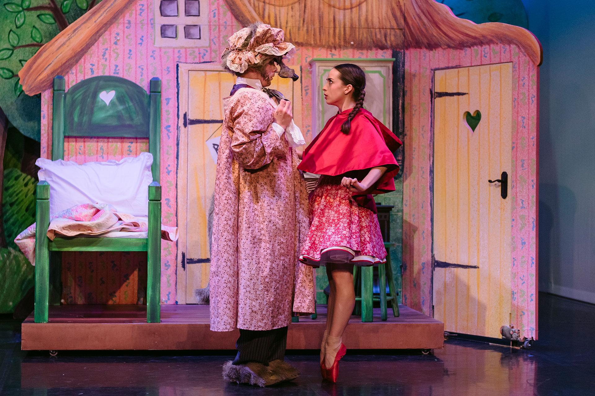 Little Red begins to see through Wolf's cunning disguise