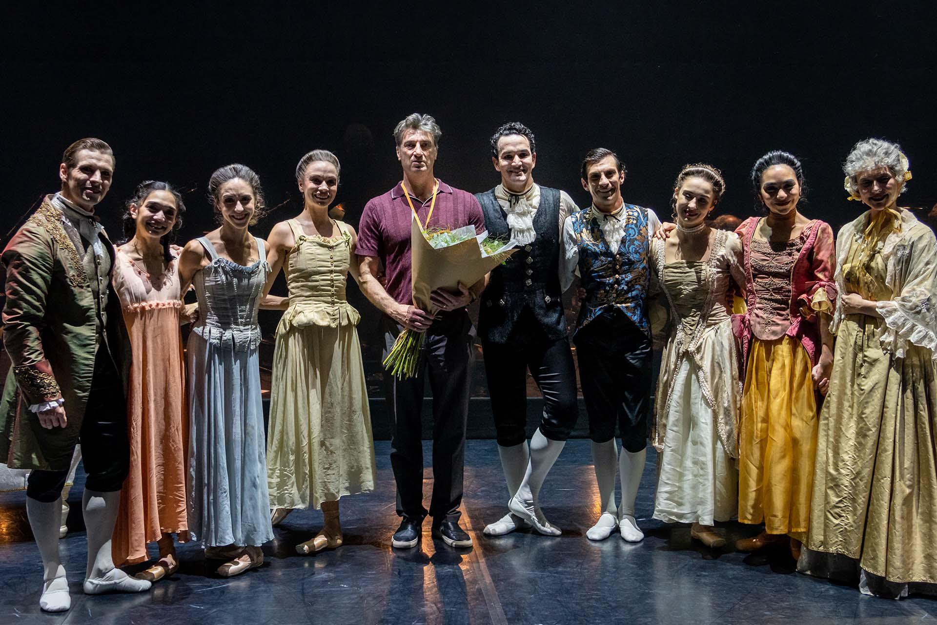 David stands with his dancers on the stage of Dangerous Liaisons