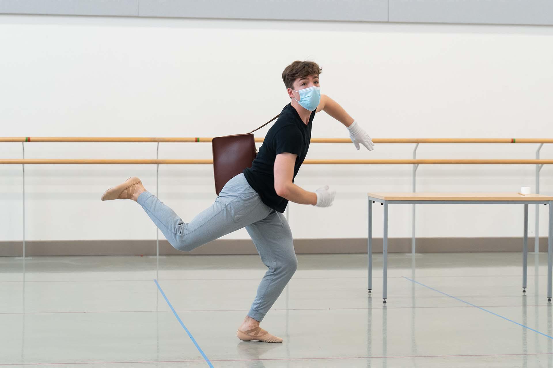 A dancer falls forward