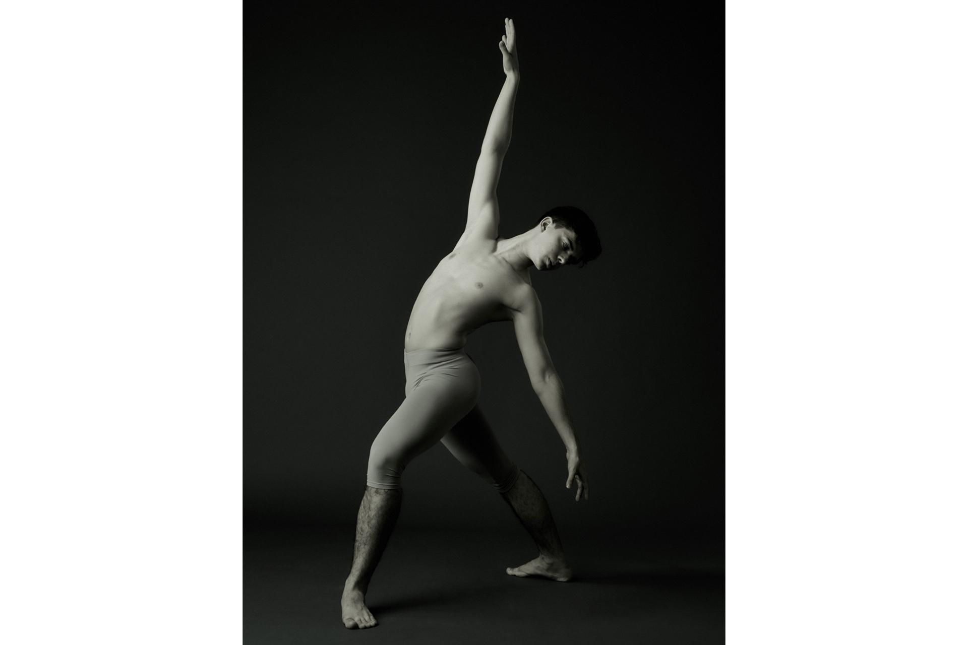 Black and White Photo of Graduate Student Tobey I'anson in a Classical, Balletic Pose
