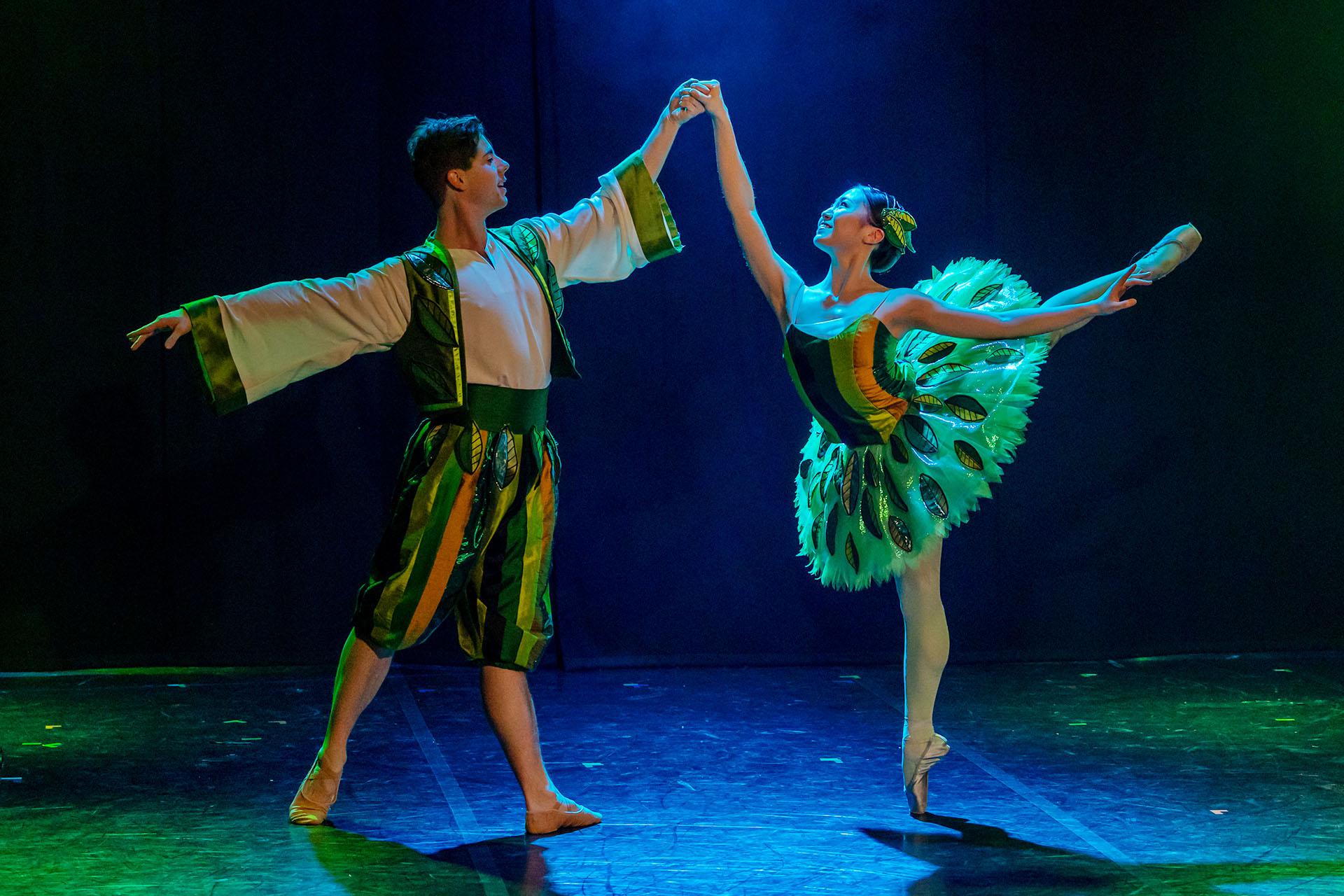 The Nature Spirits dance together and look at each other lovingly