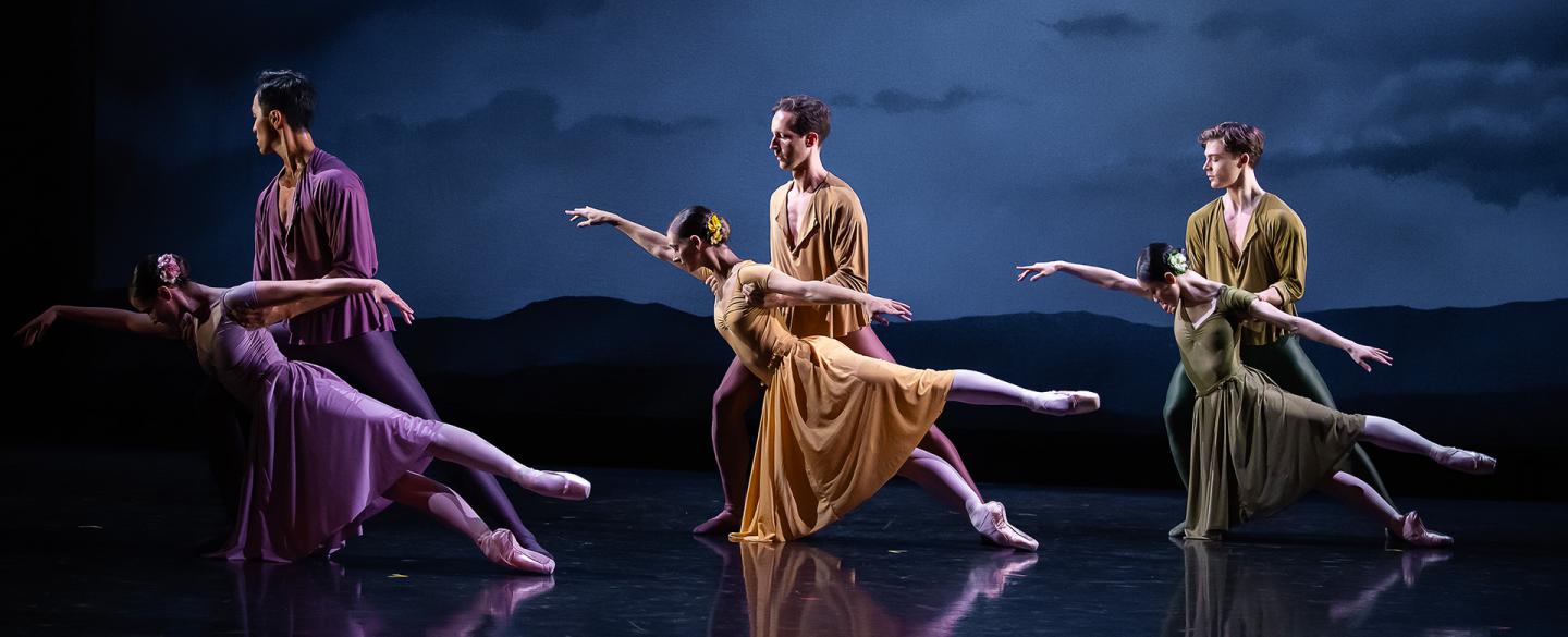 Three couple, one in lilac, one in yellow, one in green, strike identical poses where one partner stands straight holding the other as she hold one arm above her and both legs behind.