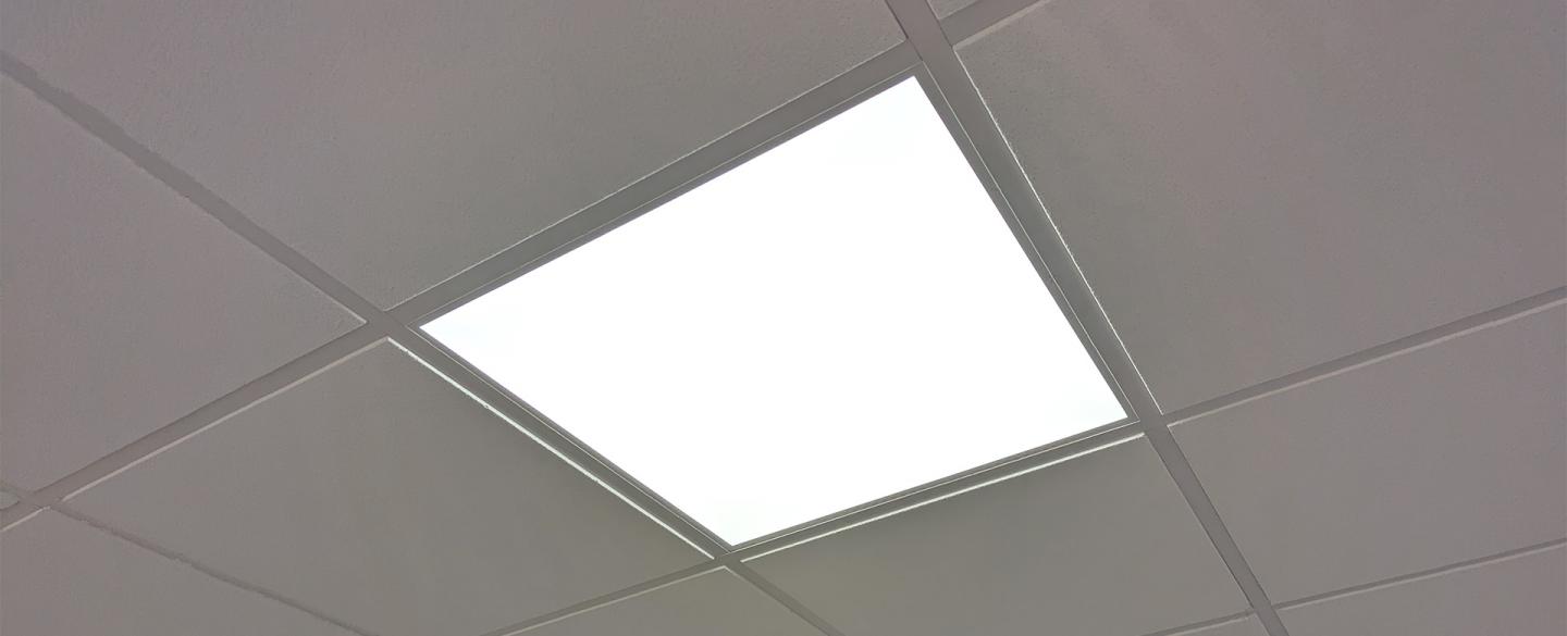 Ceiling tiles with regularly spaced out LED lighting squares