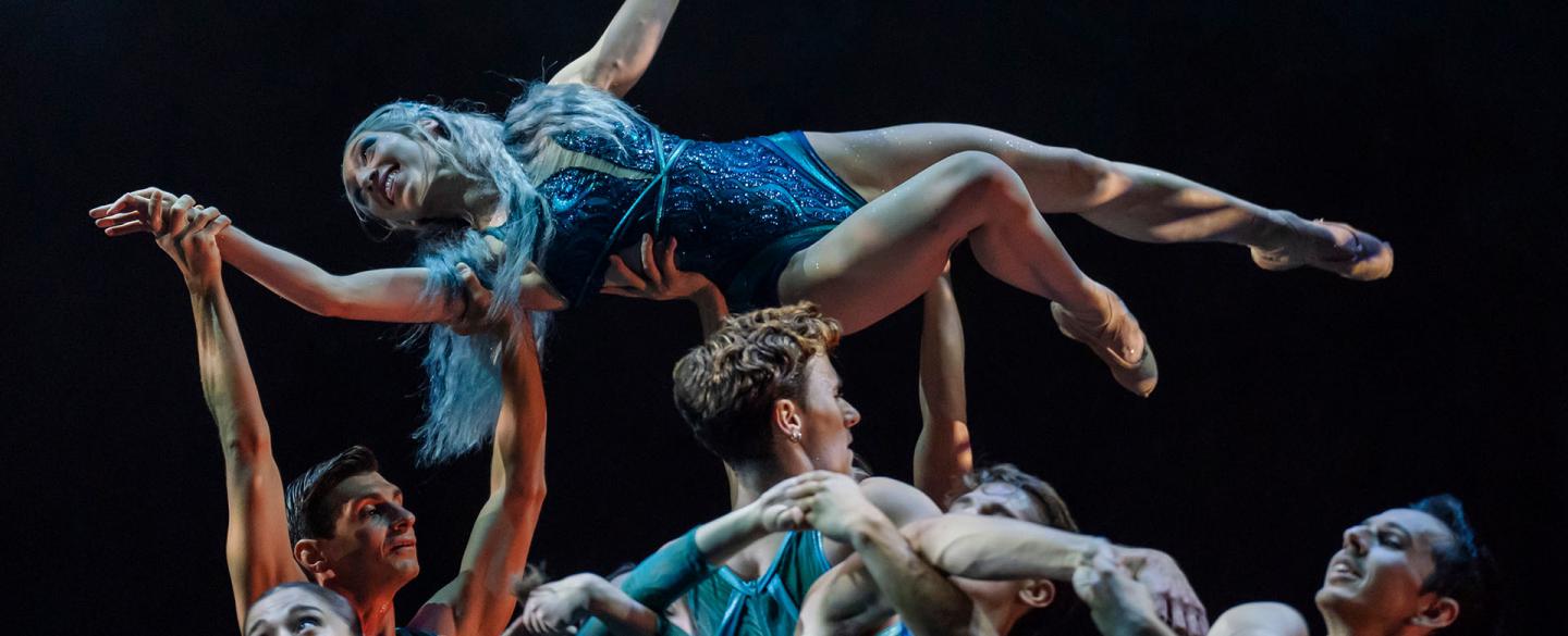 The Lady of the Lake lifted by the waters (represented by dancers)