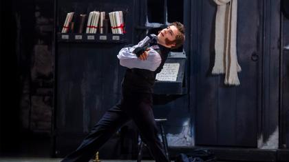 Bob Cratchit in the offices of MArley and Scrooge dancing and dreaming of a better life